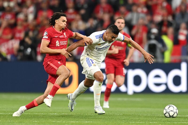 Trent Alexander-Arnold of Liverpool battles for possession with Casemiro of Real Madrid during the 2022 Champions League final. Getty