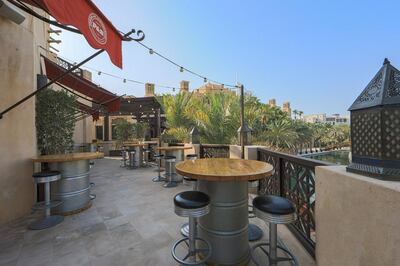 The outdoor terrace at Perry & Blackwelder's offers views of Souk Madinat and its waterways. Supplied