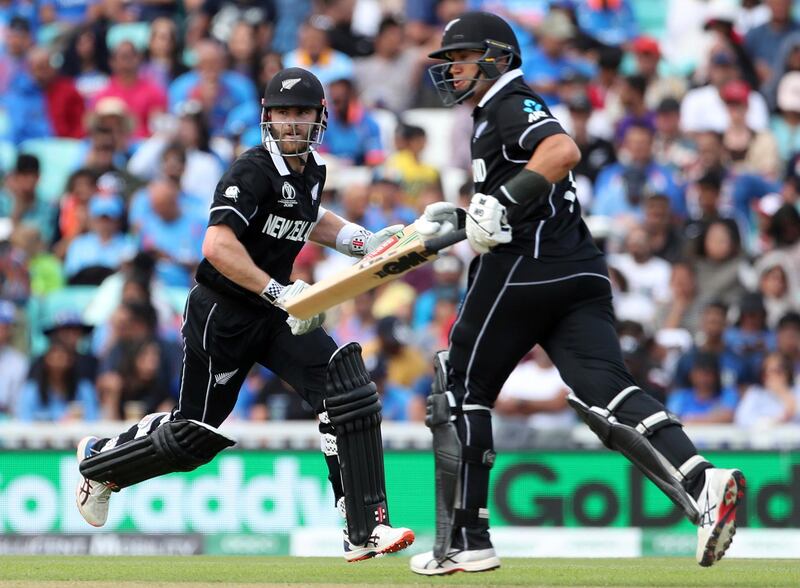 New Zealand's Kane Williamson, left, and Ross Taylor run between the wickets to score during the Cricket World Cup warm up match between India and New Zealand at The Oval in London, Saturday, May 25, 2019. (AP Photo/Aijaz Rahi)