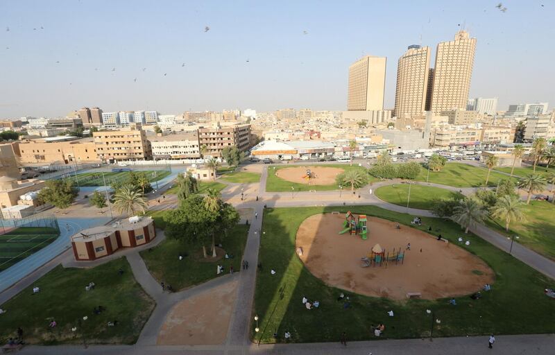 People sit at Al Futah Park, after the government lifted coronavirus disease (COVID-19) lockdown restrictions, in Riyadh, Saudi Arabia July 5, 2020.  REUTERS/Ahmed Yosri