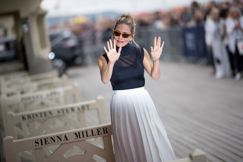 Sienna Miller unveils her dedicated beach locker room on the Promenade des Planches at the 45th Deauville American Film Festival on September 11, 2019. AFP