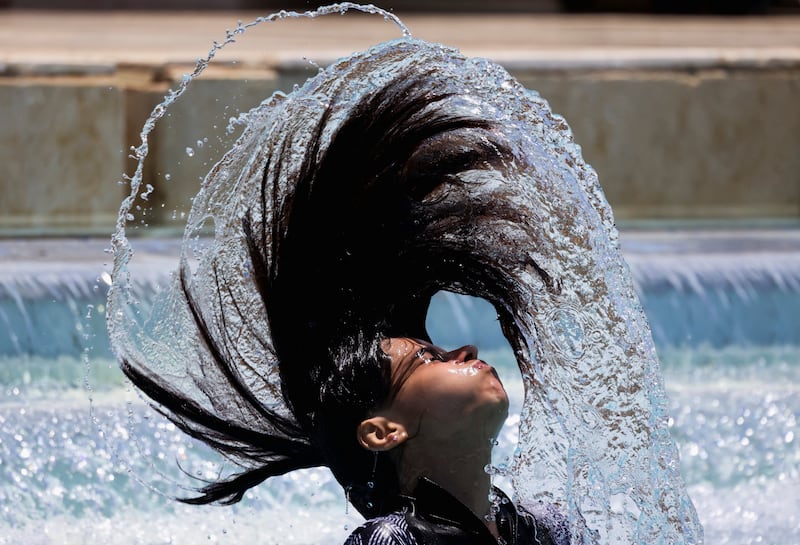 An Egyptian girl cools off in the water amid a heatwave, at a Red Sea resort in Hurghada Egypt. Reuters