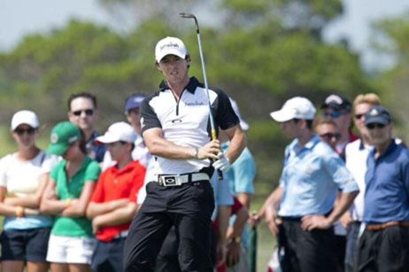 Rory McIlroy watches his shot on the fourth green during the third round at Kiawah Island
