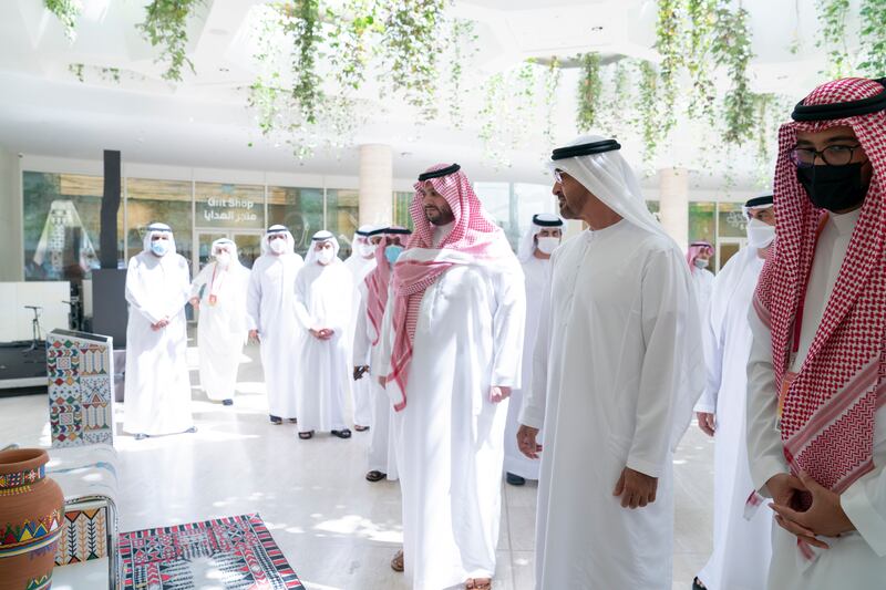 Sheikh Mohamed bin Zayed, Crown Prince of Abu Dhabi and Deputy Supreme Commander of the Armed Forces, during his visit to Saudi Arabia's pavilion at Expo 2020 Dubai. With Sheikh Mohamed is Prince Turki bin Mohammed bin Abdulaziz, Minister of State and Member of the Cabinet of the Kingdom of Saudi Arabia, third from right.