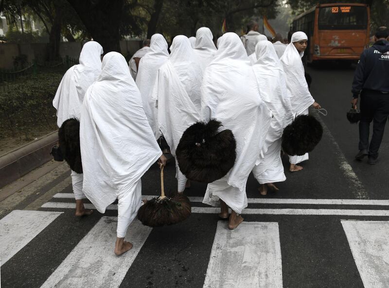 Some Jain devotees vow to renounce the material world, including clothing. Dominique Faget / AFP Photo