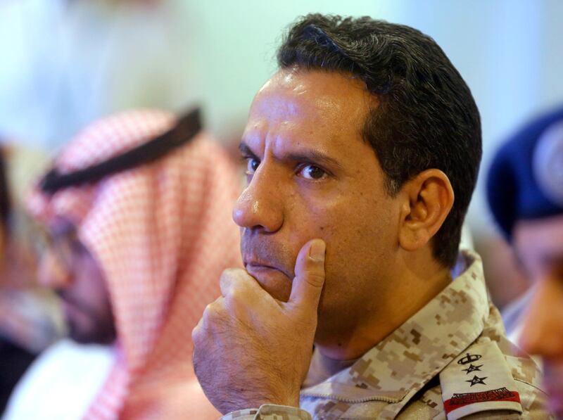 Col. Turki al-Malki, spokesman for the Saudi-led coalition fighting the Huthi forces, listens during a press conference in Mecca, Saudi Arabia, Friday, May 31, 2019. (AP Photo/Amr Nabil)