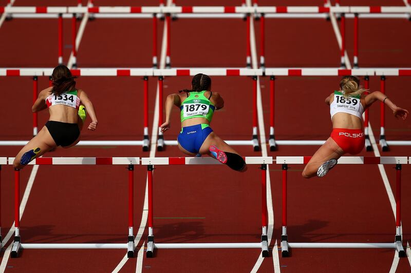 Athletes compete in the women's 100m hurdles at The IAAF World U20 Championships in Tampere, Finland. Charlie Crowhurst / Getty Images for IAAF