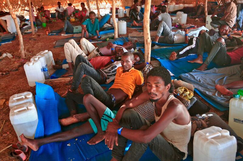 Ethiopian refugees who fled fighting in Tigray province lay in a hut at the Um Rakuba camp in Sudan's eastern Gedaref province. AFP