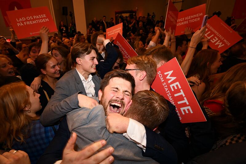 Social Democratic Party supporters celebrate victory at an election night party in Copenhagen. AFP