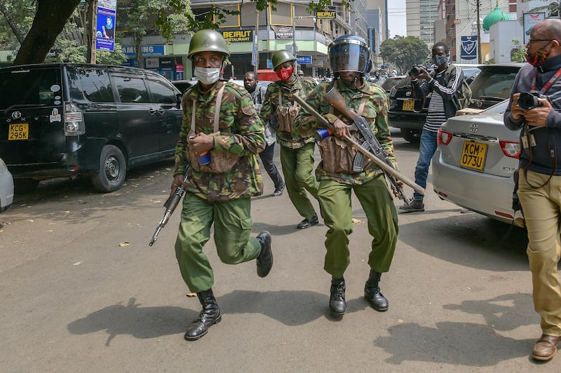 Officers from the General Service Unit (GSU) charge at protestors taking part in a march to protest against police brutality and harassment, especially against the poor, in Nairobi on July 7, 2020. - Supporters of human rights causes marched to demand accountability from the police force whom they accuse of using excessive force, including arbitrary arrests and extra-judicial killings especially during security crackdowns in Nairobi's poverty-ridden settlements.
The protests are also known as saba-saba, a phrase used to reference demonstrations that took place on the seventh day of the seventh month to agitate against the authoritarian rule of a then single-party state in the 1990's. (Photo by TONY KARUMBA / AFP)