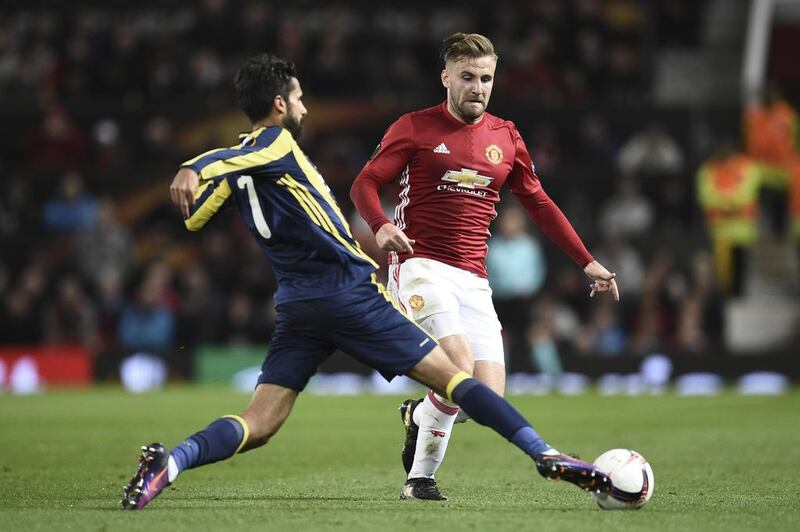 Luke Shaw, right, has had injury problems but could still be a long-term prospect at Manchester United. Oli Scarff / AFP