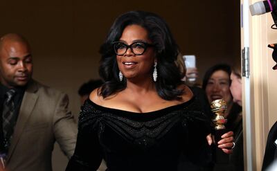 epa06424209 Oprah Winfrey holds the 2018 Golden Globe Cecil B. DeMille Award in the press room during the 75th annual Golden Globe Awards ceremony at the Beverly Hilton Hotel in Beverly Hills, California, USA, 07 January 2018.  EPA/MIKE NELSON