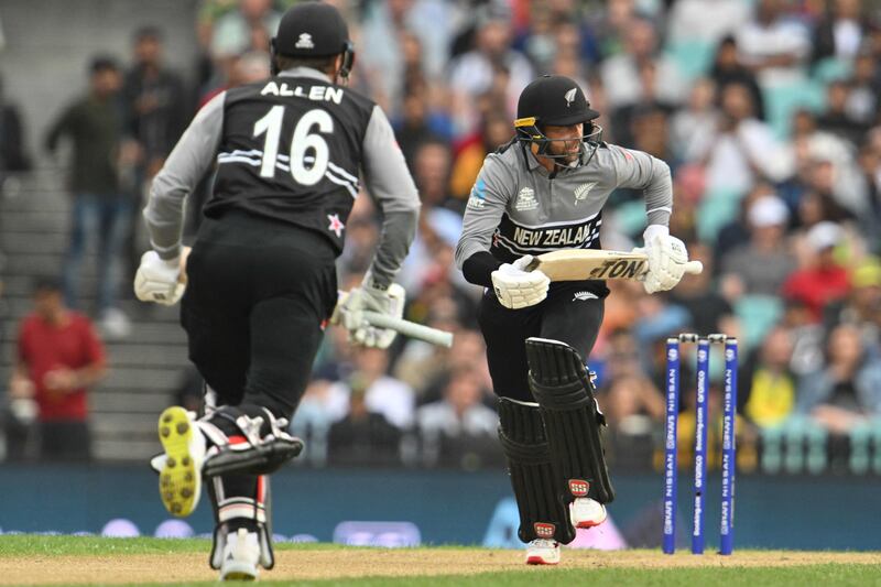 New Zealand's Finn Allen and Devon Conway run between the wickets. AFP