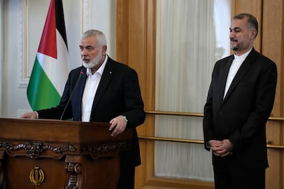 Hamas chief Ismail Haniyeh speaks during a press briefing after his meeting with Iranian Foreign Minister Hossein Amirabdollahian in Tehran, Iran. AP Photo
