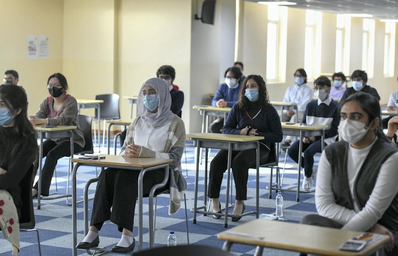 Abu Dhabi, United Arab Emirates - Pupils seated for the Biology, grade 12 exam following social distancing guidelines at Gems Cambridge International School in Baniyas. Khushnum Bhandari for The National