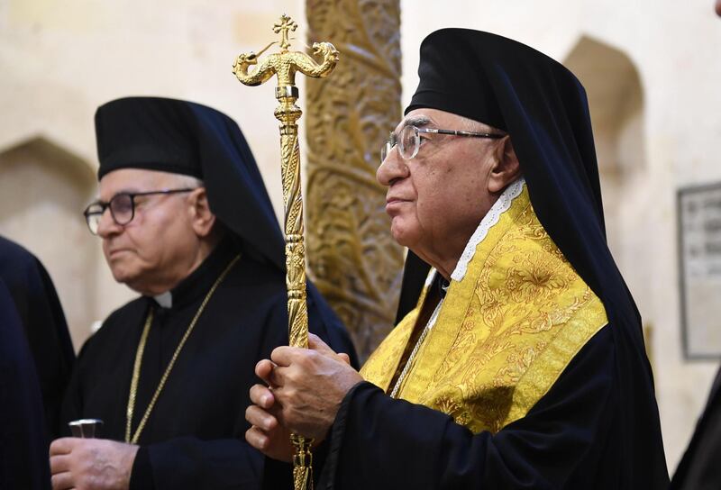 Patriarch of the Melkite Greek Catholic Church Youssef Al-Absi, right