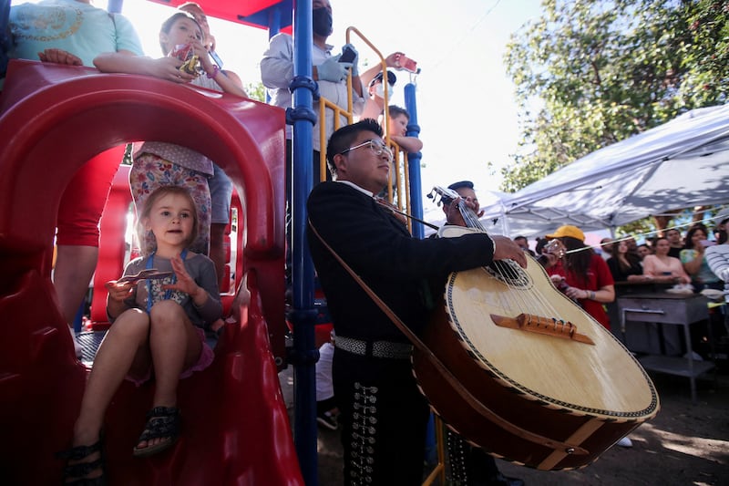 Ukrainians, who fled to Mexico amid the Russian invasion of their homeland, enjoy the performance of a mariachi band at the Benito Juarez sports complex, set up as a shelter by the local government, after arriving in Tijuana to enter the U. S. , in Tijuana, Mexico. Reuters