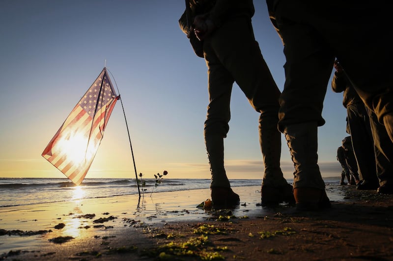 Military re-enactors gather on Omaha Beach in Saint-Laurent-sur-Mer, Normandy, France, on the 77th anniversary of the assault that helped bring an end to the Second World War. AP Photo