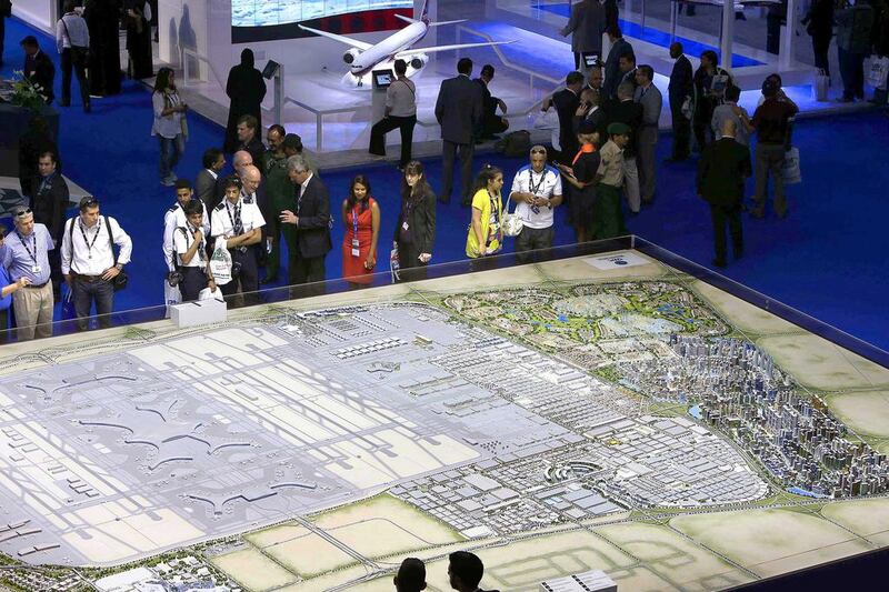 Visitors view a model of the Dubai World Central now known as Dubai South. Pawan Singh / The National