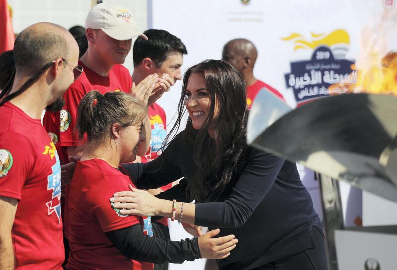 Abu Dhabi, United Arab Emirates - March 13, 2019: Stephanie McMahon the Chief brand officer of WWE hugs Chaica Al Qassimi during the arrival of Special Olympic torch team at Louvre Abu Dhabi. Wednesday the 13th of March 2019 at Louvre, Abu Dhabi. Chris Whiteoak / The National