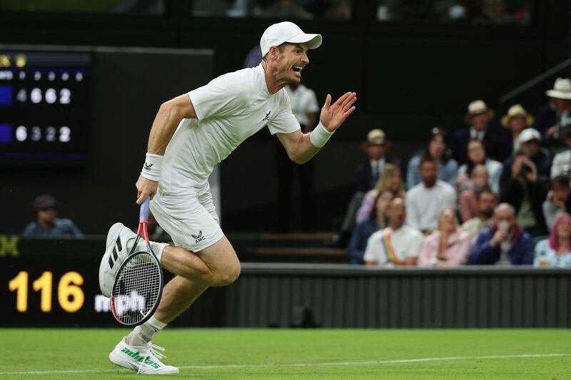 Andy Murray runs to return the ball to James Duckworth. AFP