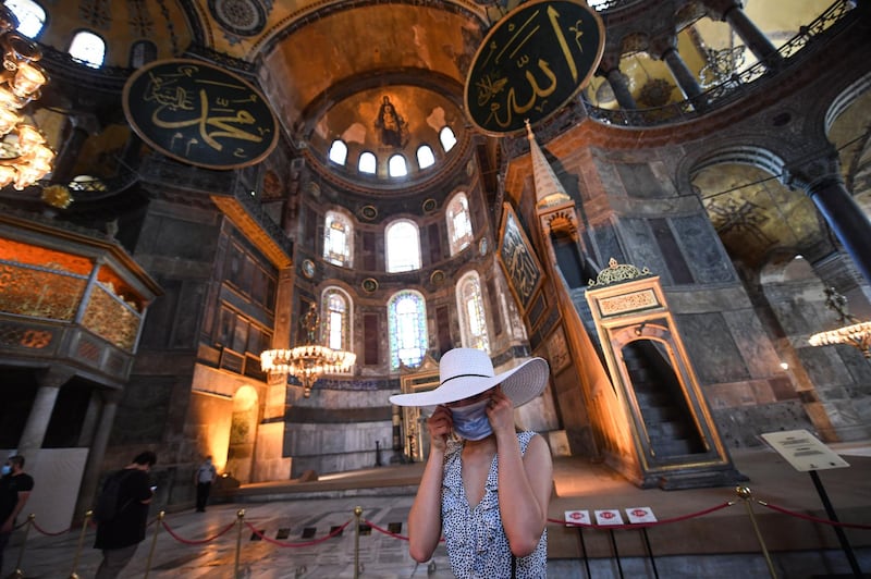 A tourist visits the inside of Hagia Sophia  in Istanbul, before a top Turkish court revoked the sixth-century Hagia Sophia's status as a museum, clearing the way for it to be turned back into a mosque. AFP