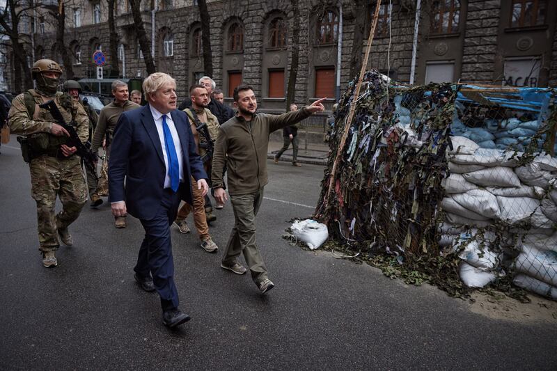 Mr Johnson and Ukrainian President Volodymyr Zelenskyy in central Kyiv in April 2022. The British prime minister paid an unannounced visit to Kyiv in a show of solidarity with Ukraine. AFP