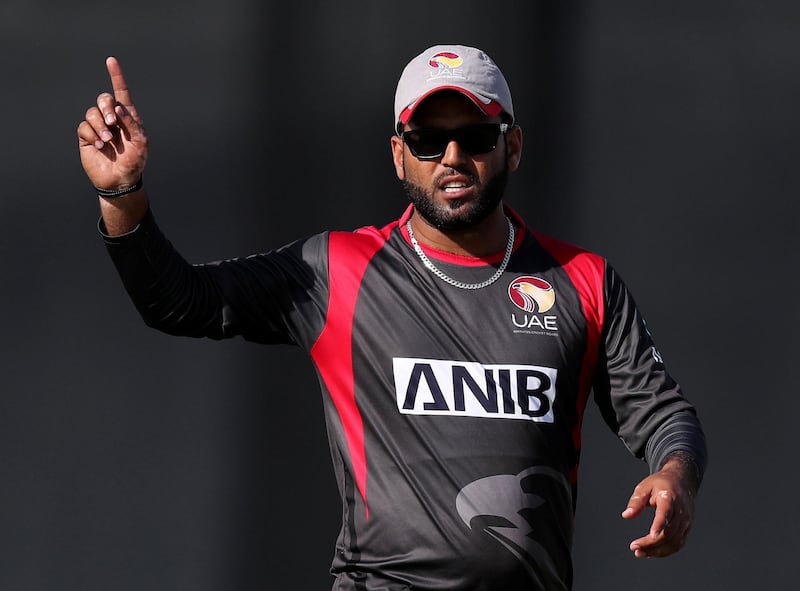Dubai, United Arab Emirates - January 31, 2019: UAE's captain Mohammad Naveed directs his field in the the match between the UAE and Nepal in an international T20 series. Thursday, January 31st, 2019 at ICC, Dubai. Chris Whiteoak/The National