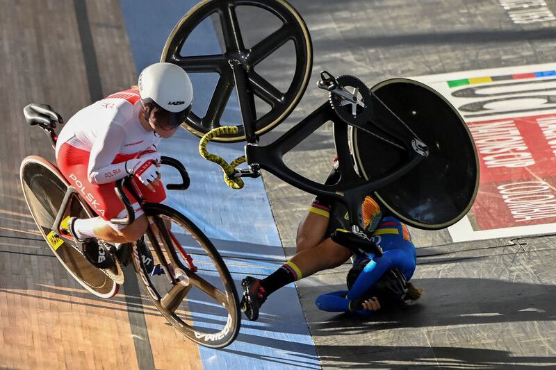 Poland's Daria Pikulik, left, and Lina Rojas of Colombia collide during the women's madison final during the UCI Track Cycling Nations Cup in Cali, Colombia, on September 12. AFP