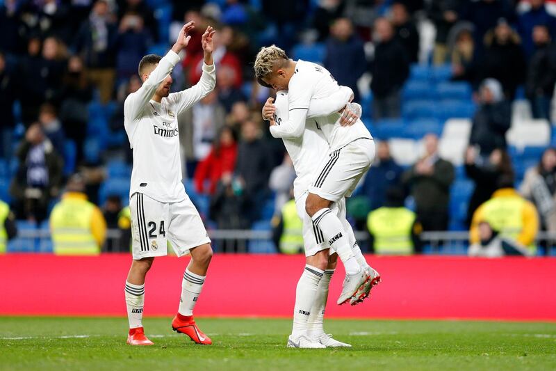 Real Madrid's Mariano, right, celebrates with teammates Sergio Ramos and Daniel Ceballos, left. AP Photo