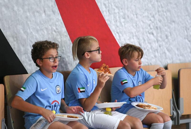 Abu Dhabi, United Arab Emirates - Game screening of Manchester City vs. Brighton Albion football match along with an Iftar buffet at Mubadala Arena, Zayed Sports City. Khushnum Bhandari for The National
