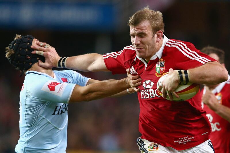SYDNEY, AUSTRALIA - JUNE 15:  Tom Croft of the Lions fends off Tom Kingston of the Waratahs on his way to scoring a try during the match between the NSW Waratahs and the British & Irish Lions at Allianz Stadium on June 15, 2013 in Sydney, Australia.  (Photo by Mark Kolbe/Getty Images) *** Local Caption ***  170601034.jpg