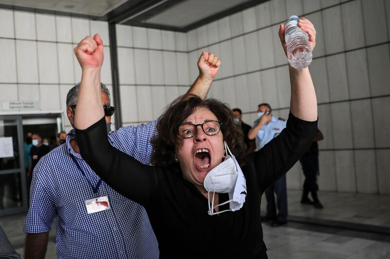 Magda Fyssa, mother of anti-racist Greek rapper Pavlos Fyssas, reacts after the trial. Reuters