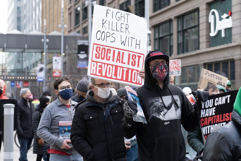 Demonstrators march through downtown Minneapolis. Willy Lowry / The National