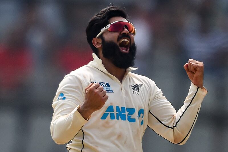 New Zealand bowler Ajaz Patel celebrates after taking the wicket of India's Mohammed Siraj - the spnner's tenth of the innings - on Day 2 of the Second Test at the Wankhede Stadium in Mumbai on December 4, 2021.