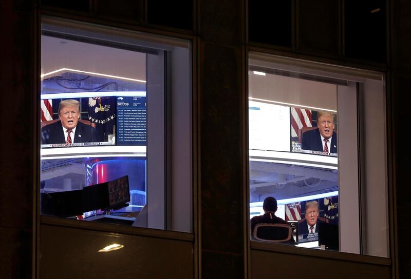 Donald Trump is seen on screens at Fox News headquarters in midtown Manhattan. EPA