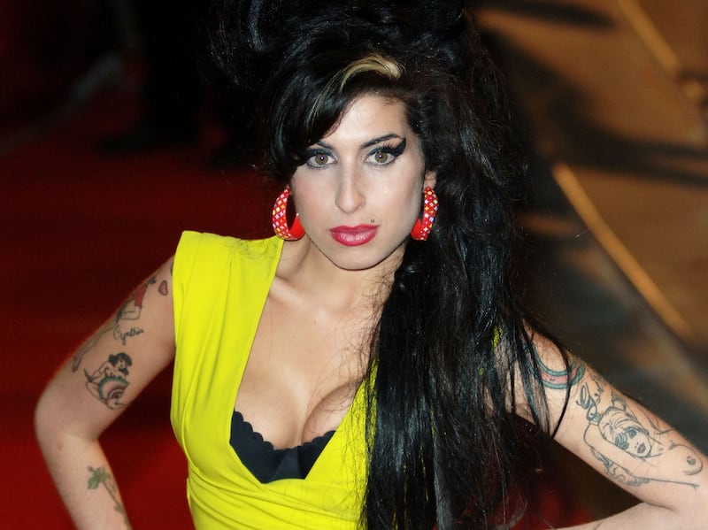 The dress worn by Amy Winehouse to the 2007 Brit Awards will feature in the Design Museum's exhibition, Amy: Beyond the Stage. Getty Images