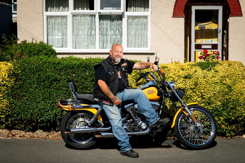 Trevor Manlow, 53, a motorcycle dealer in Hillingdon, West London, with his 2000 Harley Davidson Dyna Wide Glide. 'It makes me angry, kids see these cars and bikes on the street and at shows and smile, they love it. However, the Ulez expansion is going to kill this.' All photos: PA