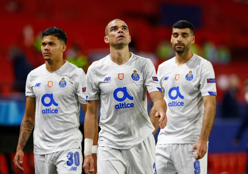 FC Porto's Evanilson, Pepe and Mehdi Taremi look dejected after the match. Reuters