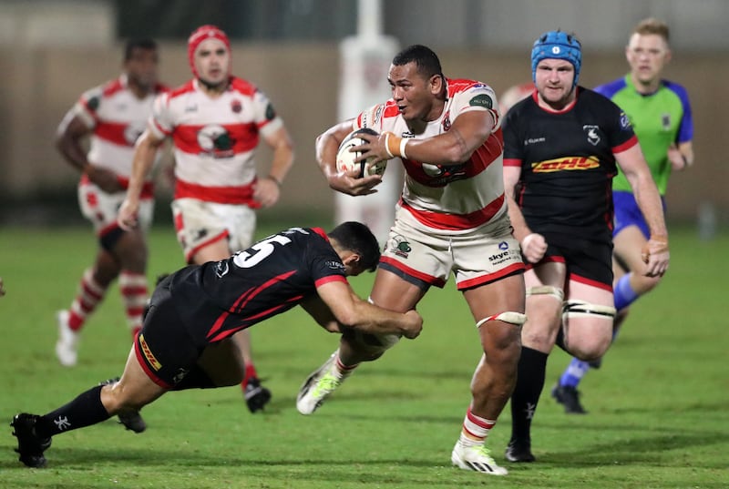 Dubai Tigers' Esekaia Dranibota is tackled in the West Asia Premiership game against Bahrain at Tigers Park, Dubai, on Friday, March 22, 2024. All photos: Chris Whiteoak / The National