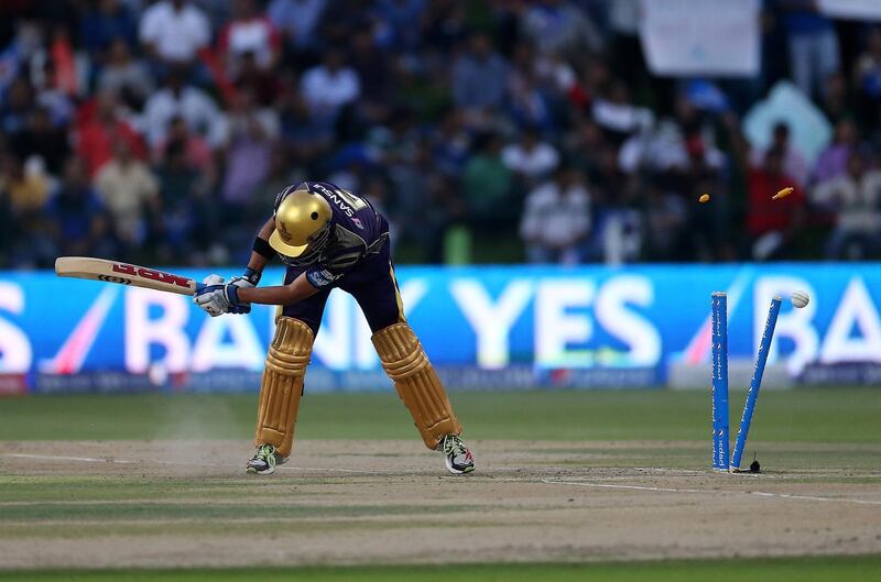 
ABU DHABI , UNITED ARAB EMIRATES Ð April 16 , 2014 : Gautam Gambhir , Captain of KKR bowled out by Lasith Malinga in the IPL opening match between Mumbai Indians vs Kolkata Knight Riders at Zayed Cricket Stadium in Abu Dhabi. ( Pawan Singh / The National ) For Sports. Story by Osman