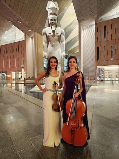 The Ayoub sisters donned gowns by the British designer Zaeem Jamal to perform at the Grand Egyptian Museum in celebration of its completion last month. Photo: The Ayoub Sisters