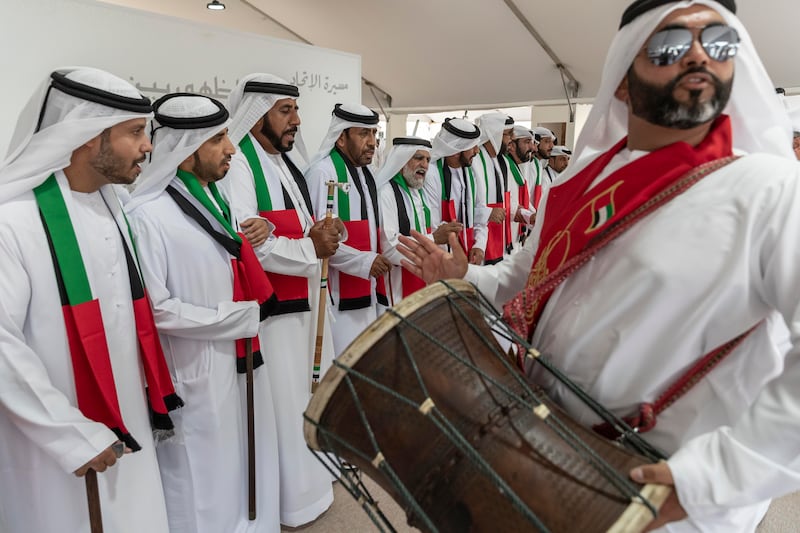 Emiratis, members of the Al Dhuhoori Tribe from between Sharjah and Ras Al Khaimah, prepare for the parade.

