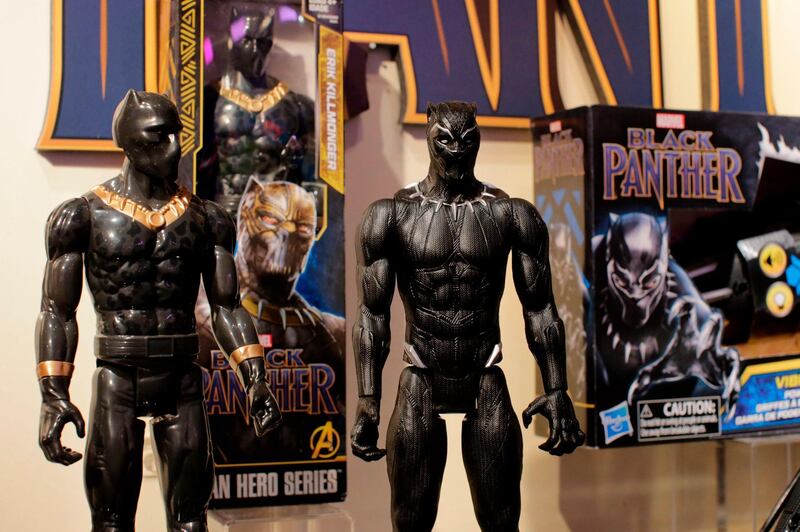 Black Panther toys are displayed to attendees at the Hasbro showroom during the annual New York Toy Fair, on February 20, 2018, in New York. Panther claws, masks and action figures are leaping off store shelves after runaway hit "Black Panther" -- the first film in the Marvel universe focused on a black superhero -- shredded box office expectations with a massive opening weekend. AFP