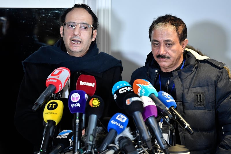 Abdul Malik al-Hajry and Abdul Majid Hanash, representatives for the Huthi rebel delegation, speaks at a press briefing during the ongoing peace talks on Yemen held at Johannesberg Castle, in Rimbo, Sweden. AP