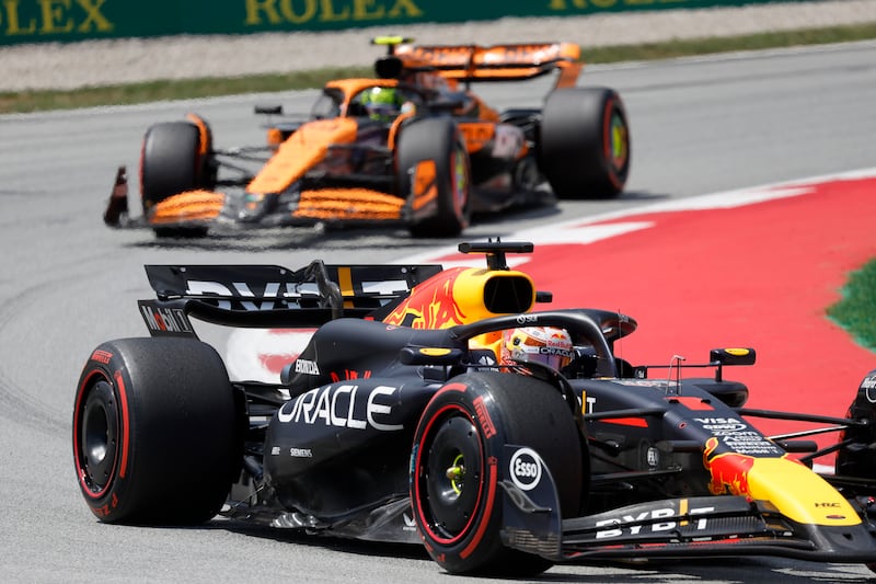 Red Bull driver Max Verstappen ahead of McLaren driver Lando Norris. AP