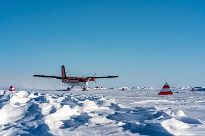 In this Wednesday April 22, 2020 photo provide by the Alfred-Wegener-Institut seven MOSAIC expedition participants were flown out with a Twin Otter plane from an arctic camp. Germany's Alfred Wegener Institute for Polar and Ocean Research says the expedition ship RV Polarstern will leave its position in the high Arctic for three weeks to rendezvous with two vessels bringing fresh supplies and crew for the MOSAIC expedition. (Christian R. Rohleder/Alfred-Wegener-Institut via AP)