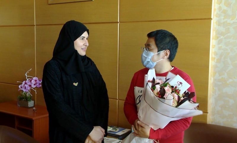 Dr Fatima Al Attar, head of international health regulations at the Ministry of Health, meets one of the patients. Wam