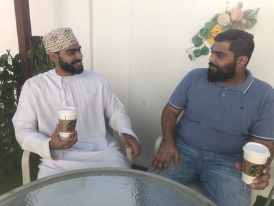 Young Omanis drinking coffee at Starbucks. Photo: Saleh Al Shaibany