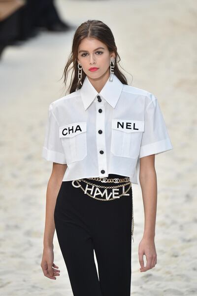 PARIS, FRANCE - OCTOBER 02:  Model Kaia Gerber walks the runway during the Chanel show as part of the Paris Fashion Week Womenswear Spring/Summer 2019 on October 2, 2018 in Paris, France.  (Photo by Stephane Cardinale - Corbis/Corbis via Getty Images)